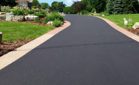 asphalt contractor, paver border on asphalt driveway